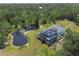 Unique home with solar and a personal pond viewed from above at 4888 Old Ranch Rd, Sarasota, FL 34241