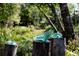 Beautiful backyard landscape with a trees and custom backyard art at 4888 Old Ranch Rd, Sarasota, FL 34241