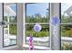 Bay window view of lush landscaping and access to backyard at 4888 Old Ranch Rd, Sarasota, FL 34241