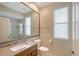 Bathroom featuring single sink vanity with granite countertop, toilet and walk-in shower at 5080 Timber Chase Way, Sarasota, FL 34238