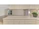 Open concept kitchen featuring stainless steel appliances and eat-in counter at 5124 Palm Aire Dr, Sarasota, FL 34243
