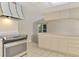 Open concept kitchen featuring stainless steel appliances and plenty of countertop space at 5124 Palm Aire Dr, Sarasota, FL 34243