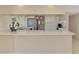 Bright kitchen featuring stainless steel appliances and an eat-in counter at 5124 Palm Aire Dr, Sarasota, FL 34243