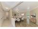 Bright dining area with tile flooring and an open concept layout, and dining table with seating at 5124 Palm Aire Dr, Sarasota, FL 34243