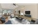A cozy living room and dining area perfect for Gathering gatherings and entertaining guests at 5124 Palm Aire Dr, Sarasota, FL 34243