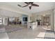 Open floor plan connecting living, dining, and kitchen areas for easy entertaining at 538 Magellan Dr, Sarasota, FL 34243