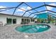 Stunning pool area with lounge chairs and a screened enclosure for enjoying outdoor living at 538 Magellan Dr, Sarasota, FL 34243