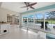 Bright sunroom with views of the pool, patio, and golf course at 538 Magellan Dr, Sarasota, FL 34243