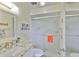 Bright bathroom features a glass-enclosed shower, granite countertop, and stylish decor at 548 Lakeside Dr # 0, Bradenton, FL 34210