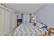 Bedroom with built-in closet and a window providing natural light at 548 Lakeside Dr # 0, Bradenton, FL 34210