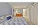 Comfortable bedroom with closet storage, dresser, and ensuite bath at 548 Lakeside Dr # 0, Bradenton, FL 34210