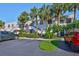 Multi-Gathering building with tropical landscaping, palm trees, and parking spots at 548 Lakeside Dr # 0, Bradenton, FL 34210