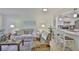 Inviting living room with decor and connecting kitchen bar at 548 Lakeside Dr # 0, Bradenton, FL 34210
