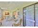 Relaxing sunroom featuring comfortable seating and bright, airy atmosphere at 548 Lakeside Dr # 0, Bradenton, FL 34210