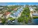 Coastal home featuring dock access and lush tropical landscaping at 6005 N Beach Rd # 16, Englewood, FL 34223