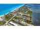 Aerial view of a home with a pool, near the beach and the bay at 6005 N Beach Rd # 16, Englewood, FL 34223