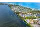 Aerial view of waterfront community with lush foliage and beach access at 6005 N Beach Rd # 16, Englewood, FL 34223