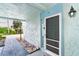 Welcoming entryway featuring a decorative door with an electronic lock and concrete pavers at 6005 N Beach Rd # 16, Englewood, FL 34223