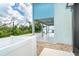 View of the side exterior of home with water views at 6005 N Beach Rd # 16, Englewood, FL 34223