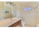 Bright bathroom featuring neutral walls, tile flooring, and a shower/tub combo at 6610 Rosy Barb Ct, Lakewood Ranch, FL 34202