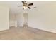 Spacious bonus room with neutral walls, carpet, and a ceiling fan at 6610 Rosy Barb Ct, Lakewood Ranch, FL 34202