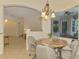 Breakfast nook area with natural light and view of the pool at 6610 Rosy Barb Ct, Lakewood Ranch, FL 34202