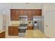 Well-appointed kitchen with granite countertops, stainless steel appliances, and ample storage at 6610 Rosy Barb Ct, Lakewood Ranch, FL 34202