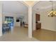 Open-concept space featuring tile flooring, natural light, and seamless flow between living areas at 6610 Rosy Barb Ct, Lakewood Ranch, FL 34202