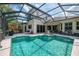 Gorgeous pool area with fountain feature, perfect for outdoor entertaining at 6610 Rosy Barb Ct, Lakewood Ranch, FL 34202