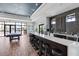Modern bar area with stylish seating and a sleek countertop at 7634 Windy Hill Cv, Bradenton, FL 34202