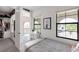 Comfortable bedroom featuring a balcony, natural light and closet at 7634 Windy Hill Cv, Bradenton, FL 34202