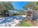 An inviting stone entrance sign welcomes residents and guests to the private St. Andrews Park neighborhood at 803 Montrose Dr # 201, Venice, FL 34293