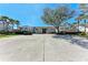Spacious condominiums with convenient carport parking, beautiful landscaping, and mature shade tree at 803 Montrose Dr # 201, Venice, FL 34293