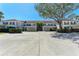Well-maintained condo units with covered parking and mature landscaping at 803 Montrose Dr # 201, Venice, FL 34293
