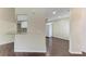 Kitchen area showcasing granite countertops and views of the hardwood floor dining area at 803 Montrose Dr # 201, Venice, FL 34293