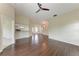 Spacious living room boasts beautiful wood floors and an open layout, perfect for entertaining at 803 Montrose Dr # 201, Venice, FL 34293