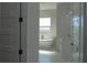 Bathroom view showcasing a standalone tub and a modern vanity at 8045 Bosco Rd, Port Charlotte, FL 33981