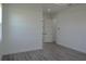 Bedroom with light gray wood flooring and modern white trim at 8045 Bosco Rd, Port Charlotte, FL 33981