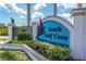 A picturesque community sign welcomes you to South Gulf Cove Waterfront Community at 8045 Bosco Rd, Port Charlotte, FL 33981