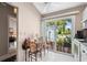 Eat-in kitchen with sliding glass doors to the patio with a view of the community at 805 Waterside Ln, Bradenton, FL 34209