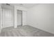 Bright bedroom featuring a closet with sliding doors, offering ample storage at 8705 Winter Breeze Way, Sarasota, FL 34241