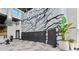 Community clubhouse featuring a climbing wall, seating, and lounge area for residents at 8705 Winter Breeze Way, Sarasota, FL 34241