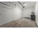 Practical garage space offers secure parking and extra storage, enhancing home functionality at 8705 Winter Breeze Way, Sarasota, FL 34241