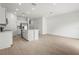 Open-concept kitchen flows seamlessly into the dining and living area, creating an ideal space for entertaining at 8705 Winter Breeze Way, Sarasota, FL 34241