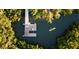 Aerial view of a kayak and dock surrounded by lush mangrove trees and waterways at 1305 4Th St # 301G, Sarasota, FL 34236