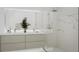 Modern bathroom with double vanity, sleek fixtures, and a luxurious, glass-enclosed shower at 1305 4Th St # 301G, Sarasota, FL 34236