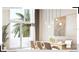 Bright dining area featuring large windows, stylish lighting, and modern furnishings at 1305 4Th St # 301G, Sarasota, FL 34236