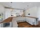 Bright kitchen boasts custom cabinets, wood countertops, and a cozy built-in breakfast nook at 1408 99Th Nw St, Bradenton, FL 34209