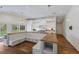 Bright kitchen boasts custom cabinets, wood countertops, and a cozy built-in breakfast nook at 1408 99Th Nw St, Bradenton, FL 34209
