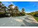 Scenic walking path with abundant trees and a visitor center along the trail at 1408 99Th Nw St, Bradenton, FL 34209